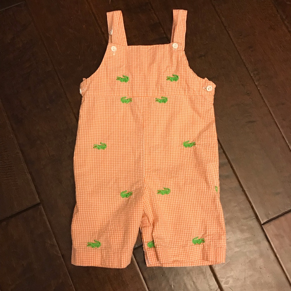 Orange gingham romper with embroidered alligators